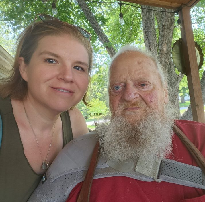 Daughter and Father sitting next to each other